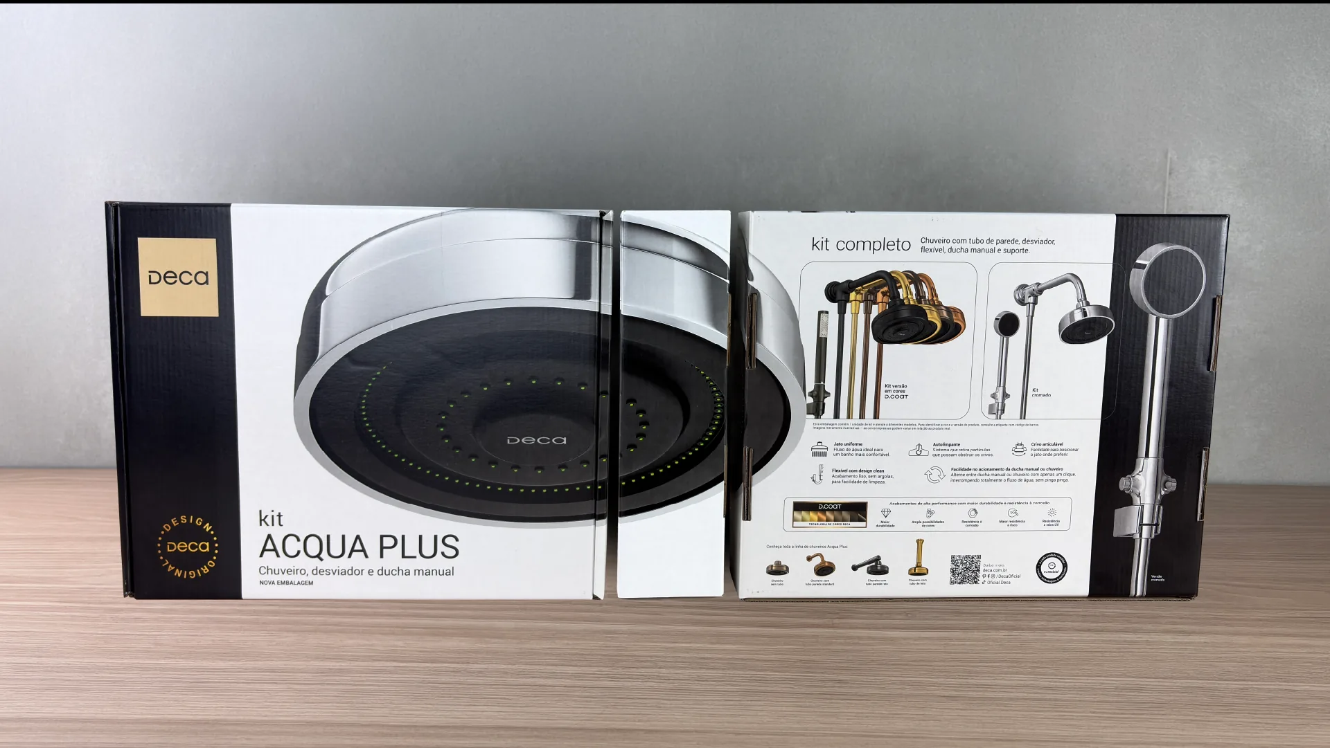 Two Acqua Plus packs side by side, front and back, showing the shower image crossing the edges and continuing from one panel to the next.