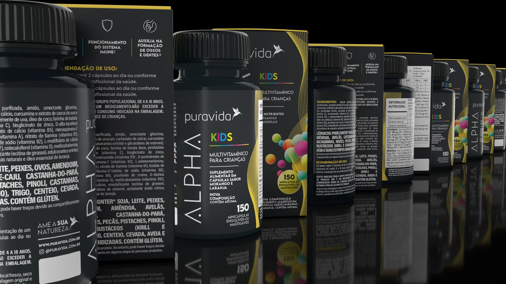 Row of Puravida Alpha Kids bottles and cartons in black, with the coloured sphere graphic and the Kids name in multicoloured letters.