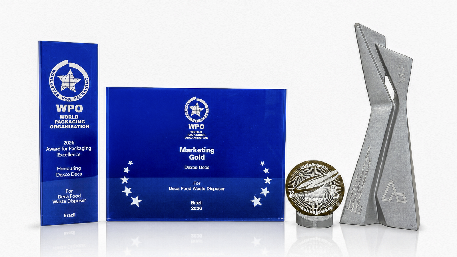 The trophies and seals from the project's awards gathered next to the Deca disposer pack.